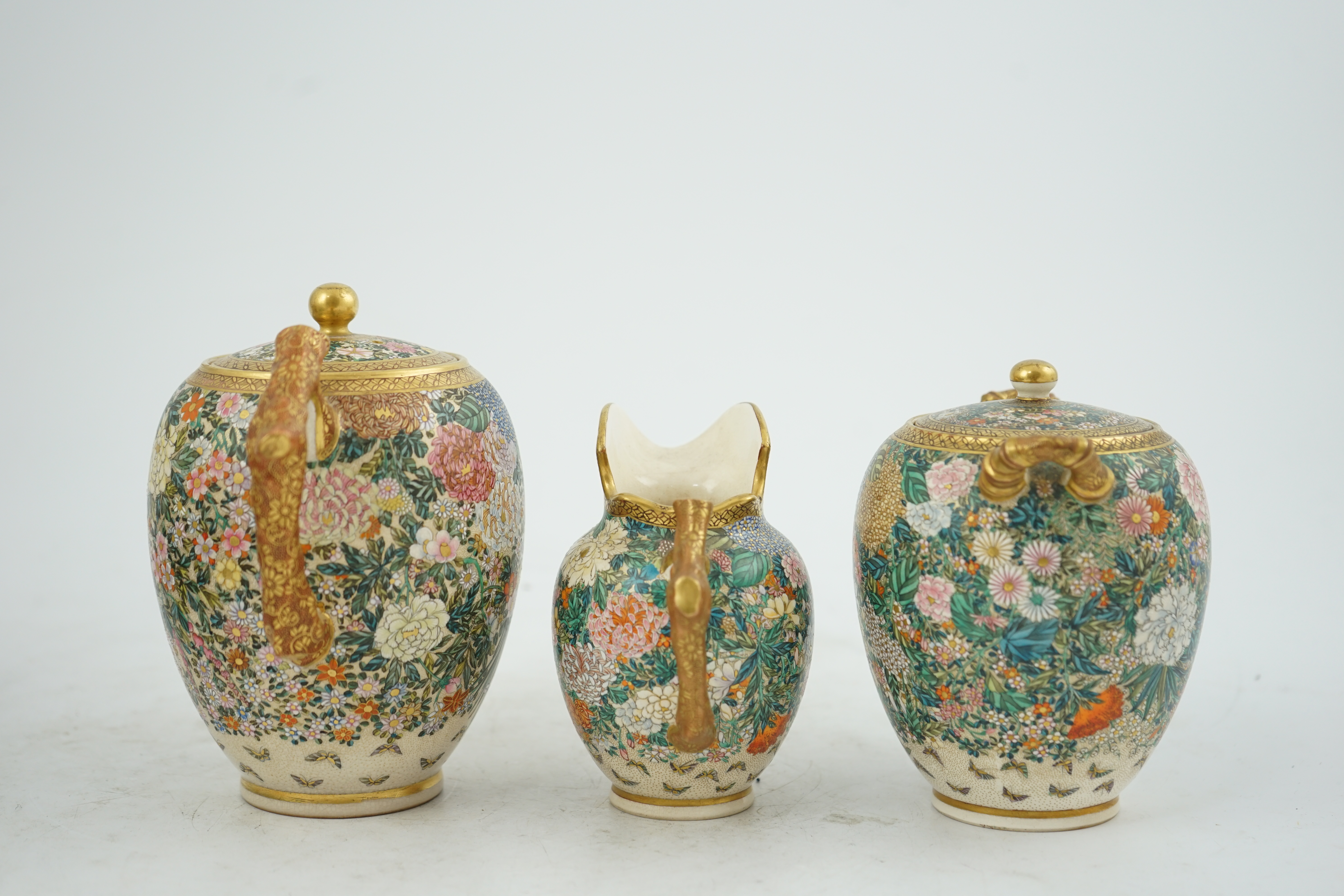 A fine Japanese Satsuma ‘millefleur’ three piece teaset, by Kinkozan, Meiji period